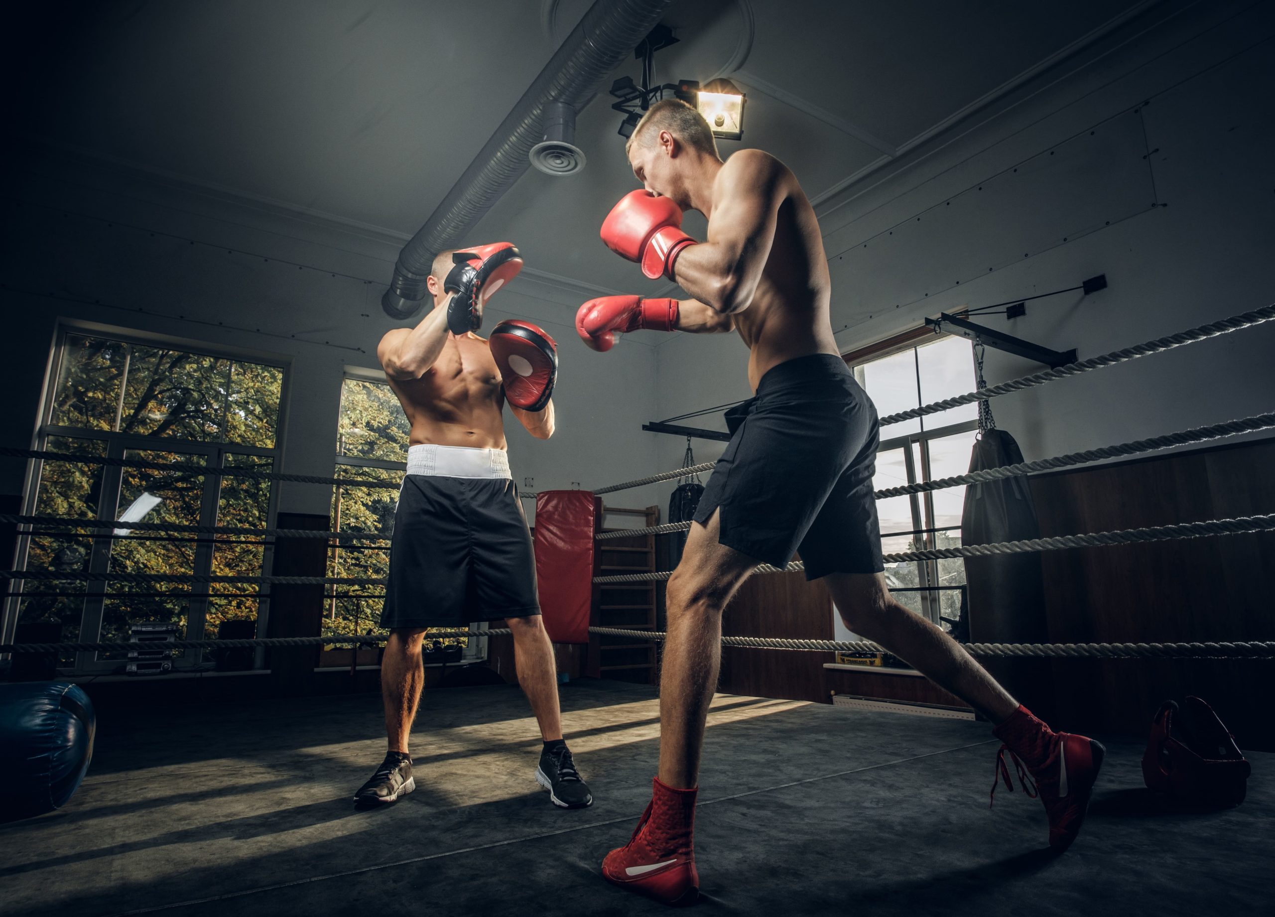 young-boxing-trainer-his-new-student-have-training-boxing-ring-min